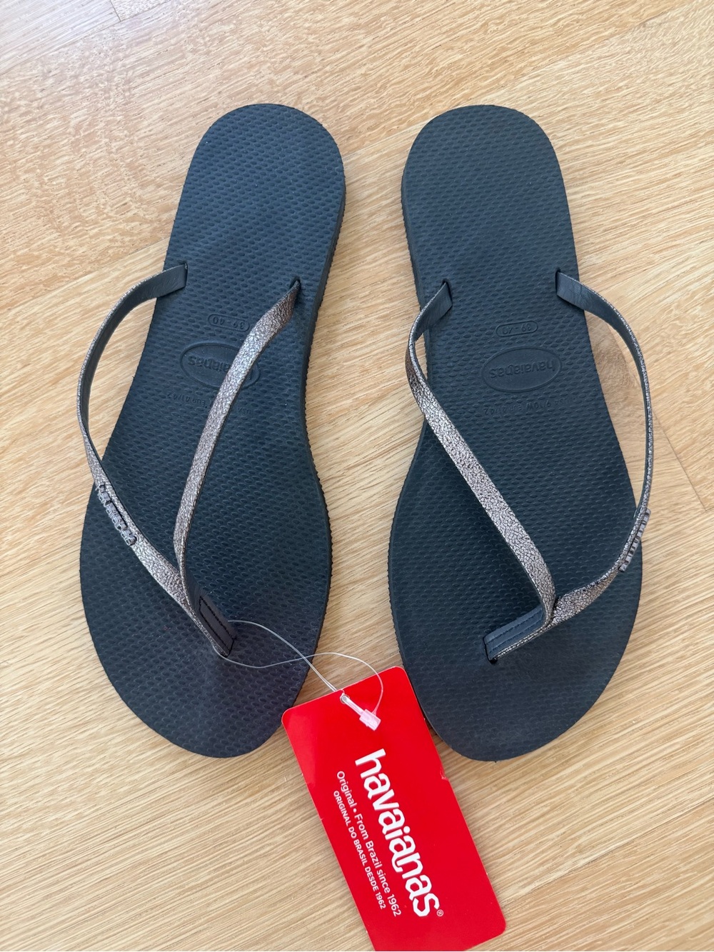 Havaianas Flip Flops in Black with Metallic Distressed Silver Straps